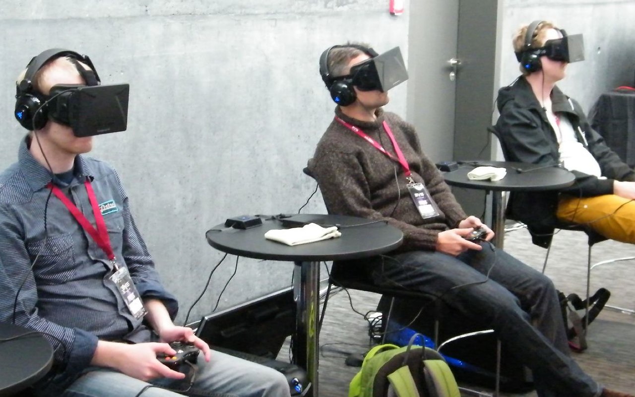 Three guys playing with oculus rift